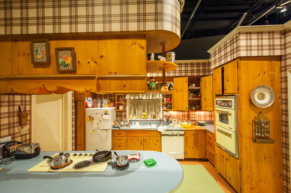 The Draper kitchen (theoriginal) and the Draper kitchen (the recreation at the Museum). Credit: Carin Baer/AMC (1) and Thanassi Karageorgiou/Museum of the Moving Image (2)