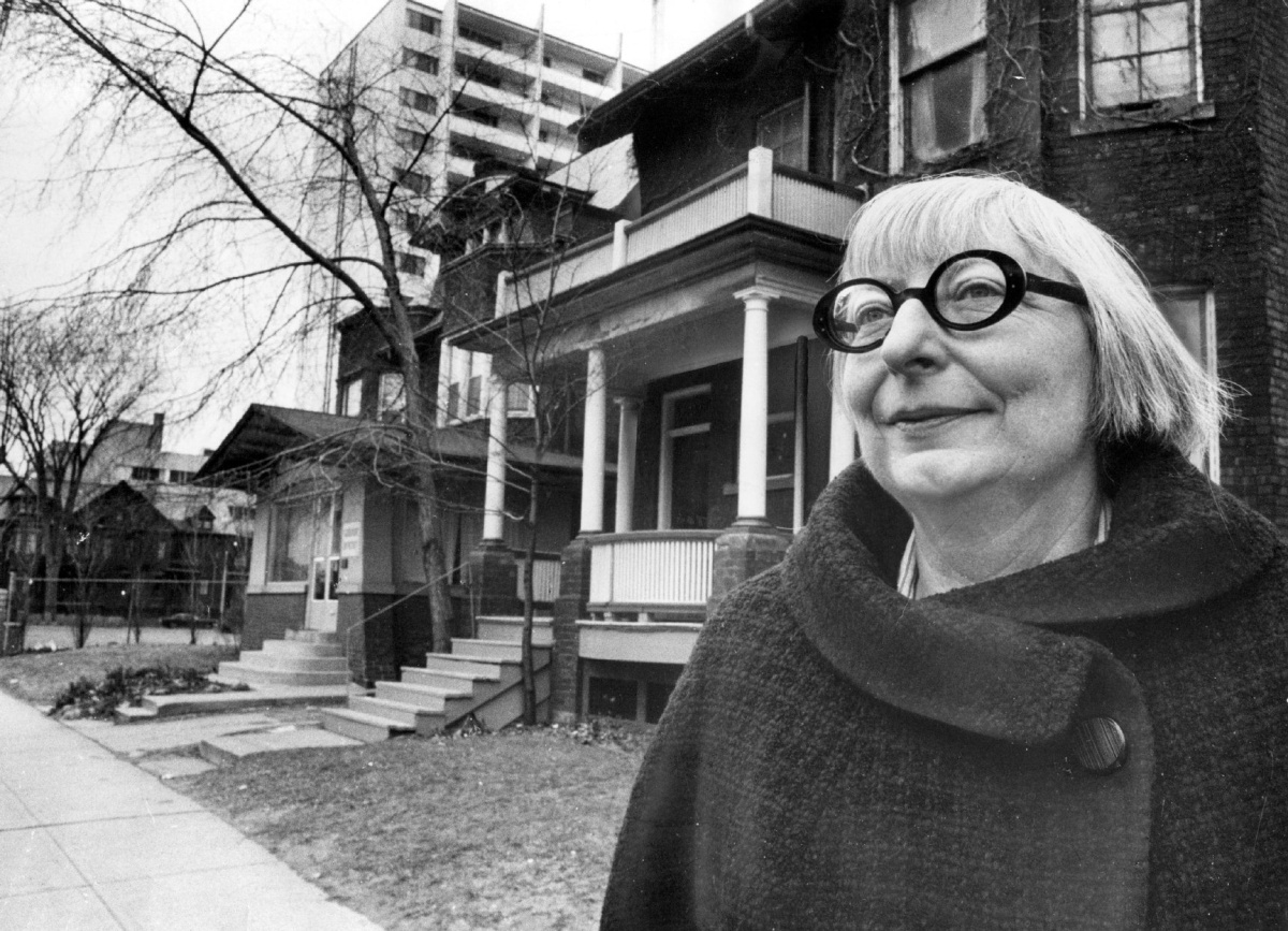 SCANNED FROM THE TORONTO STAR LIBRARY *U42 GRAPHIC Jane Jacobs outside her home on Spadina Road just north of Bloor Street. Photo taken by Frank Lennon/Toronto Star Dec. 21, 1968. Also published 19730425 with caption: Jane Jacobs. Urban affairs expert. Also published 19740520 with caption: Toronto's in good shape, says author Jane Jacobs, but "We've got to be thinking about how we make sure it stays that way." Just being Canadian gives it some advantage, she says, but she fears amalgamation will bring some of the problems of cities like New York.