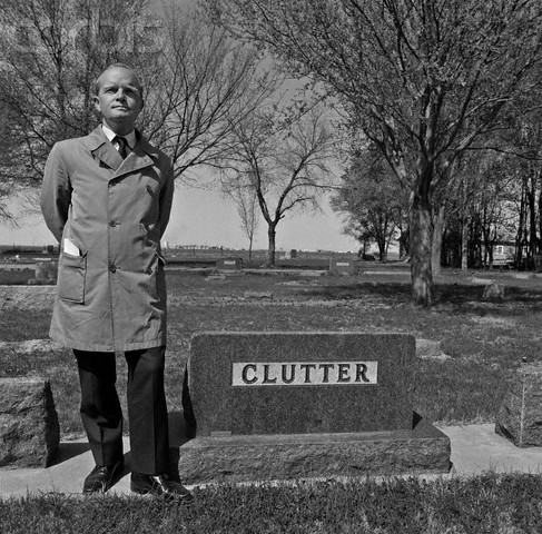 1967, Holcomb, Kansas, USA --- Author Truman Capote poses at the grave of the murdered Clutter family, made famous in his novel and in the film . --- Image by © Bob Adelman/Corbis